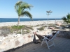 The back porch of the palapa is hard to abandon, just look at Lacey with her Kindle reading away
