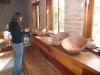Lacey checking out the clay pottery