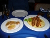 Shrimp stuffed with fish and avocado and wrapped in string potates and then deep fried to perfection