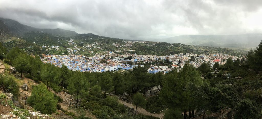 A view of the town from our campsite up above. We were told there were two peaks behind the village which give it its name, but we never got to see them.